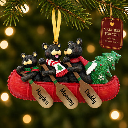 Bear canoe family of 3 christmas ornament hanging on a lit Christmas tree with a Made Just For You gift tag
