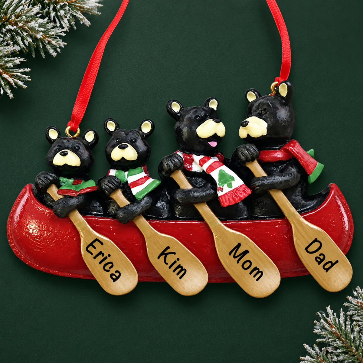 Personalized bear canoe family of 4 christmas ornament on a dark green pine background