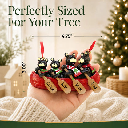 Size guide: the personalized bear canoe family of 4 christmas ornament is 4.75 in wide by 3.00 in tall, shown in hand