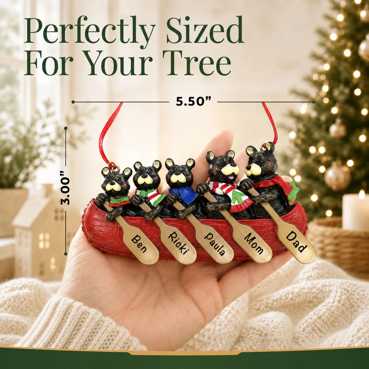 Size guide: the personalized bear canoe family of 5 christmas ornament is 5.50 in wide by 3.00 in tall, shown in hand