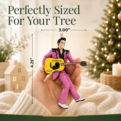 Personalized Elvis Presley guitar Christmas ornament held in hand to show size, about 3 inches wide by 4.25 inches tall