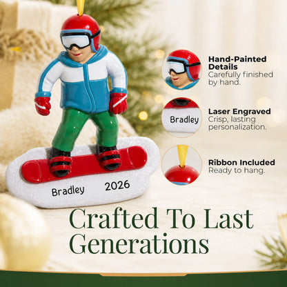 Hand-painted details and laser engraved personalization on the snowboarding guy christmas ornament, ribbon included