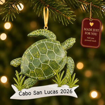 Sea turtle christmas ornament hanging on a lit Christmas tree with a Made Just For You gift tag