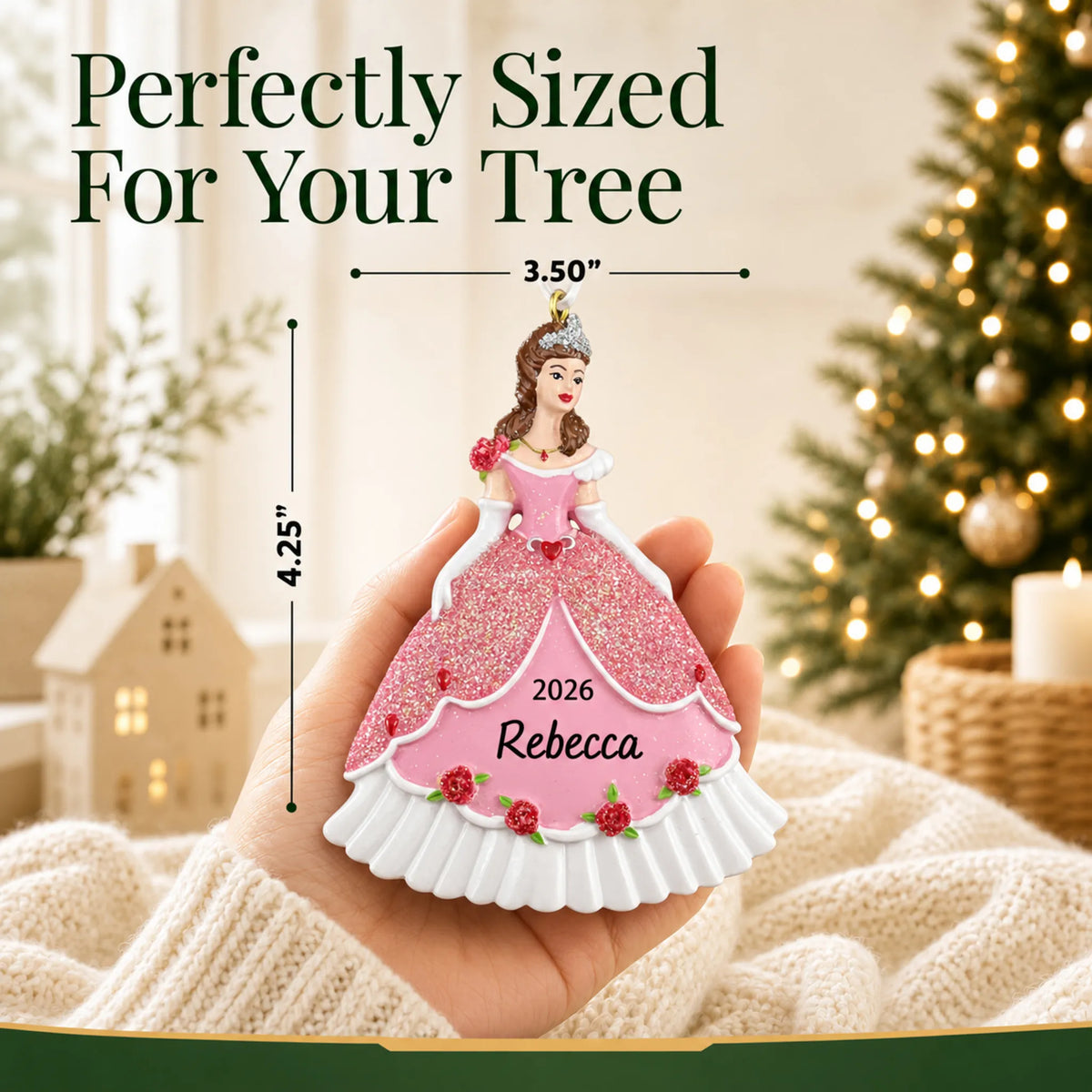 Size guide: the personalized princess pink dress christmas ornament shown in hand next to a Christmas tree