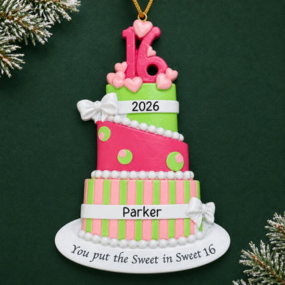 Personalized sweet 16 birthday cake christmas ornament on a dark green pine background