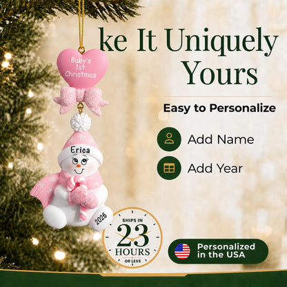 Make it yours: add name and year to the personalized pink baby's 1st christmas candy cane snowbaby ornament