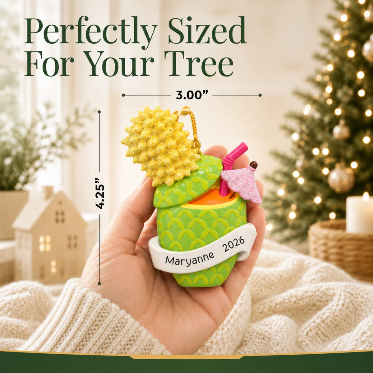Size guide: the personalized Pineapple Cocktail christmas ornament is 3.00 in wide by 4.25 in tall, shown in hand