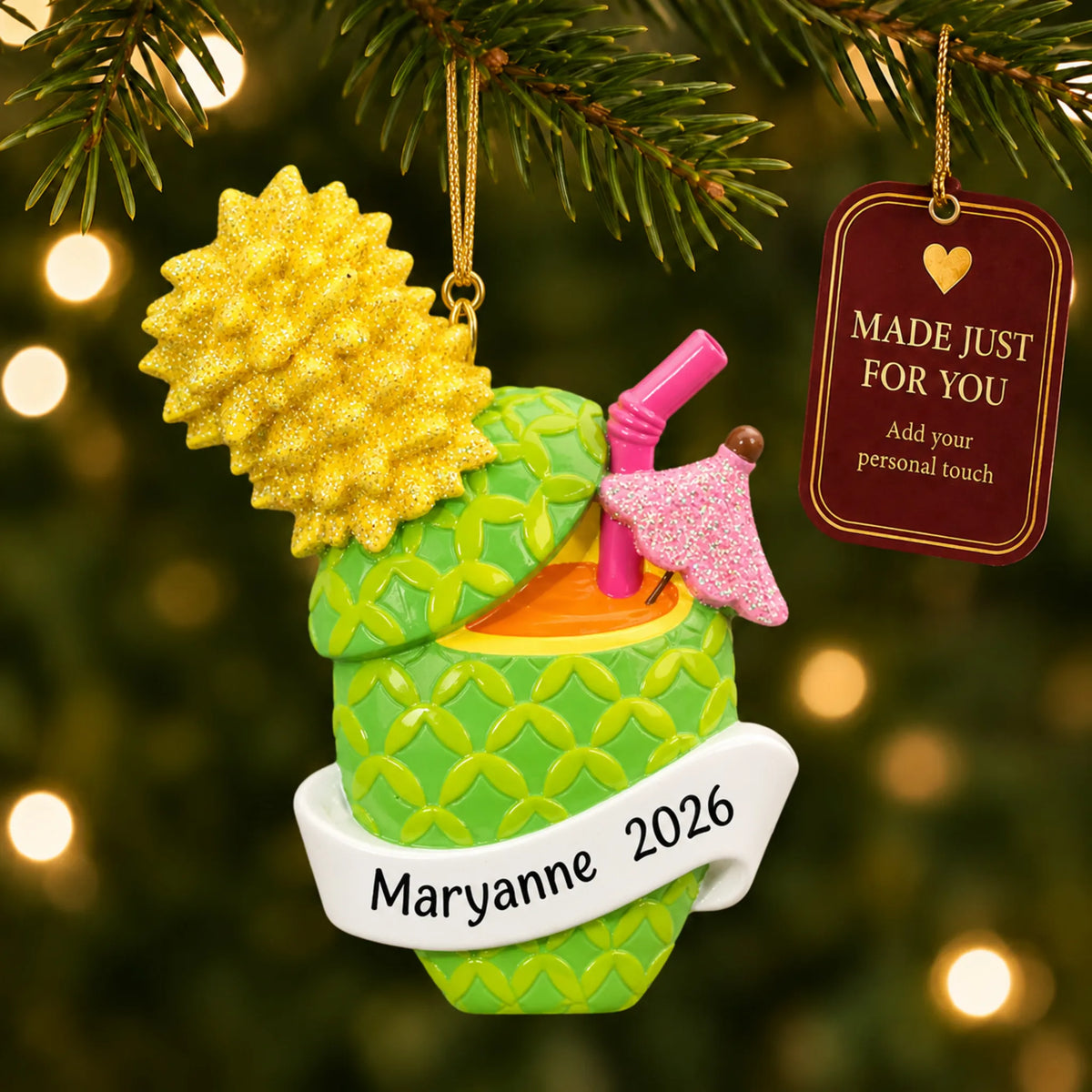 Pineapple Cocktail christmas ornament hanging on a lit Christmas tree with a Made Just For You gift tag