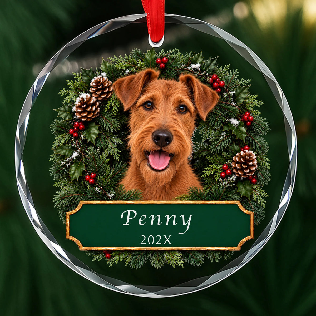 Personalized Irish Terrier Christmas ornament in round glass with a holly wreath and a green plaque engraved with a name and year