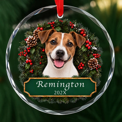 Personalized Jack Russell Christmas ornament in round glass with a holly wreath and a green plaque engraved with a name and year