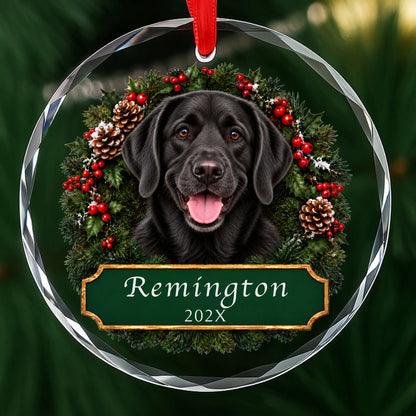 Personalized black Lab Christmas ornament in round glass with a holly wreath and a green plaque engraved with a name and year