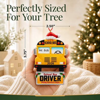 Personalized school bus driver Christmas ornament held in hand to show its size on the tree