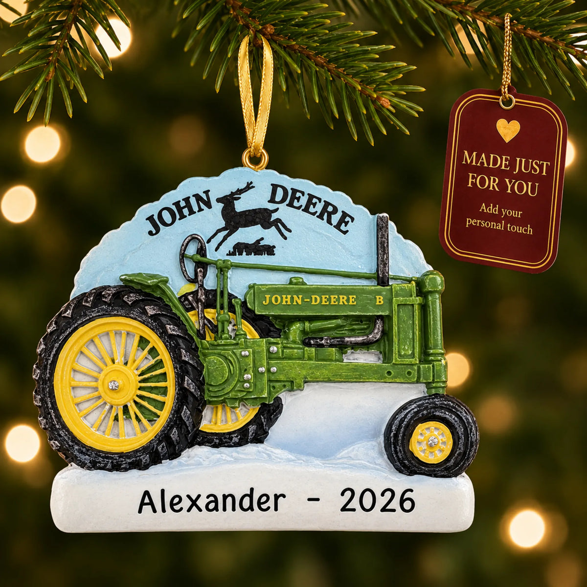 John Deere Model B Tractor christmas ornament hanging on a lit Christmas tree with a Made Just For You gift tag