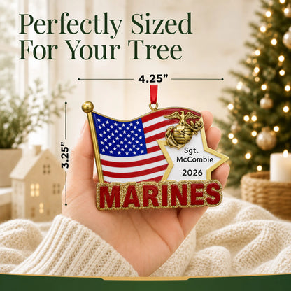 Personalized Marines U.S. flag Christmas ornament held in hand to show its size on the tree