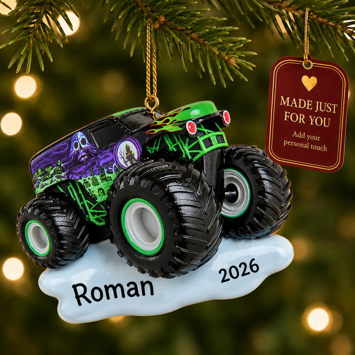 Monster truck christmas ornament hanging on a lit Christmas tree with a Made Just For You gift tag