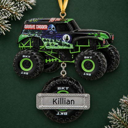 Personalized Grave Digger Monster Truck christmas ornament on a dark green pine background