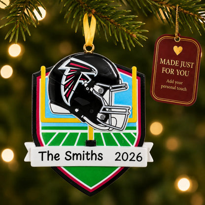 Atlanta Falcons NFL christmas ornament hanging on a lit Christmas tree with a Made Just For You gift tag