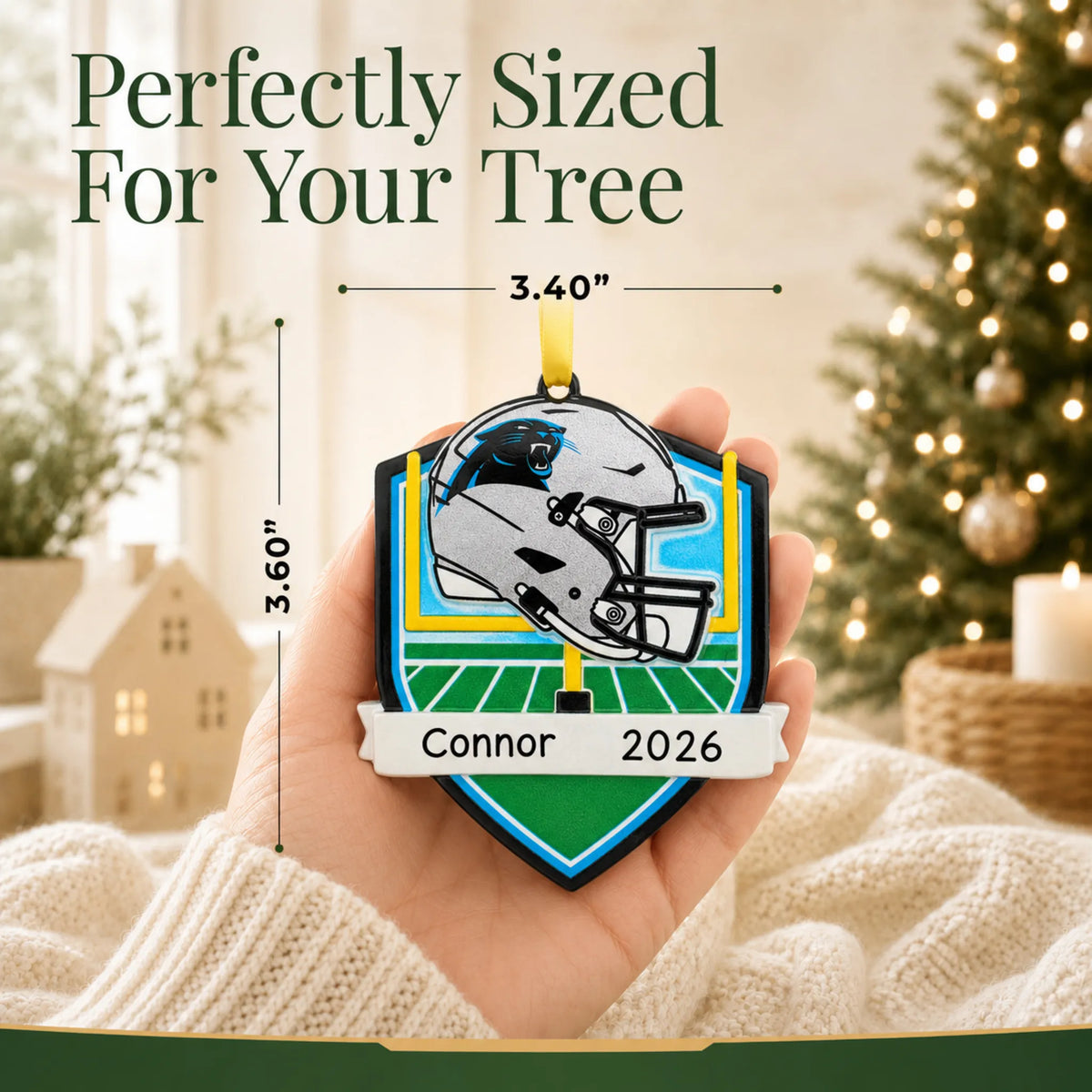 Size guide: the personalized Carolina Panthers NFL christmas ornament is 3.40 in wide by 3.60 in tall, shown in hand