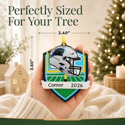 Size guide: the personalized Carolina Panthers NFL christmas ornament is 3.40 in wide by 3.60 in tall, shown in hand