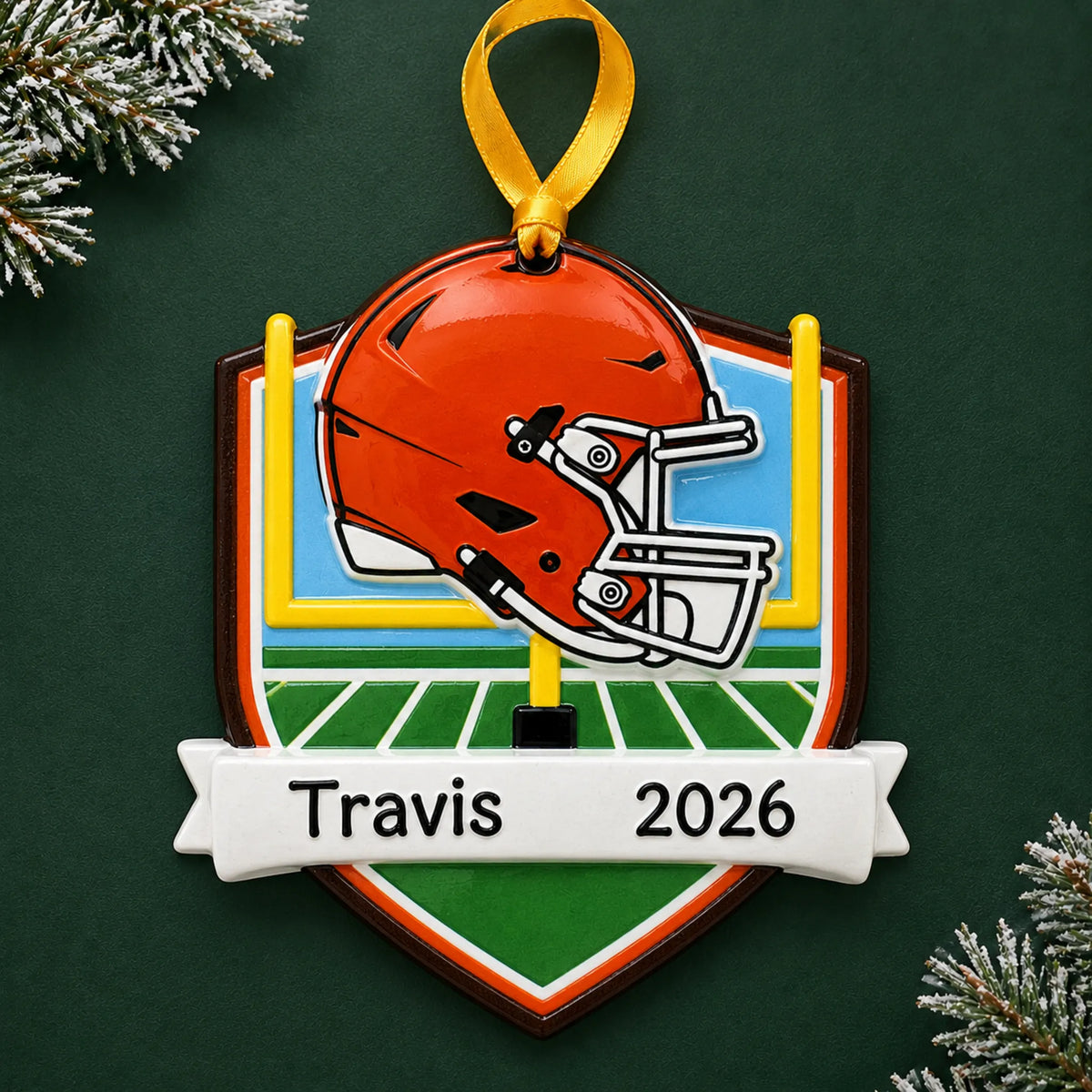 Personalized Cleveland Browns NFL christmas ornament on a dark green pine background
