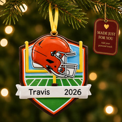 Cleveland Browns NFL christmas ornament hanging on a lit Christmas tree with a Made Just For You gift tag