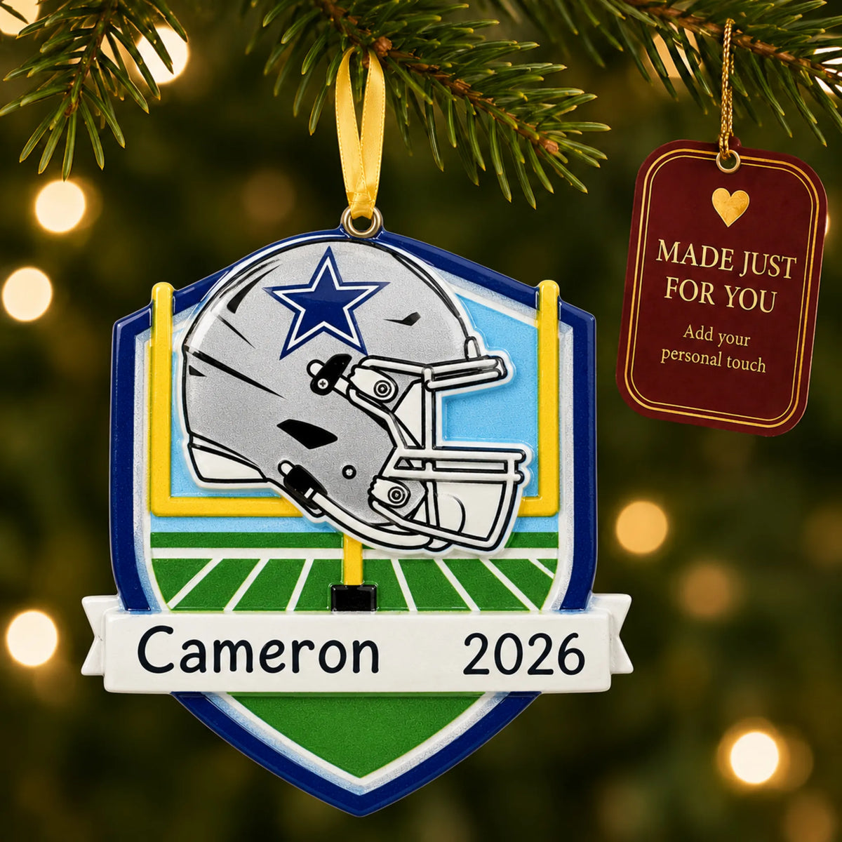 Dallas Cowboys NFL christmas ornament hanging on a lit Christmas tree with a Made Just For You gift tag