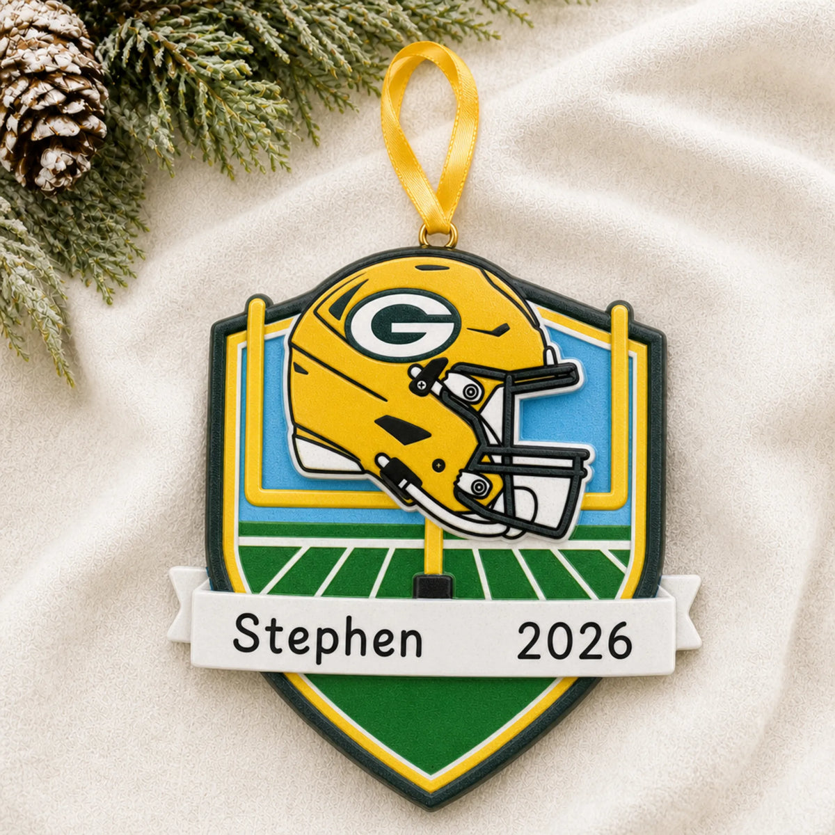 Personalized Green Bay Packers NFL christmas ornament laid on a soft white knit blanket