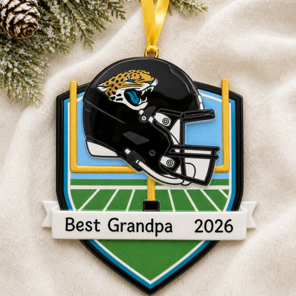 Personalized Jacksonville Jaguars NFL christmas ornament laid on a soft white knit blanket