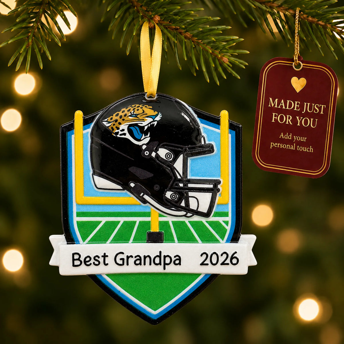 Jacksonville Jaguars NFL christmas ornament hanging on a lit Christmas tree with a Made Just For You gift tag