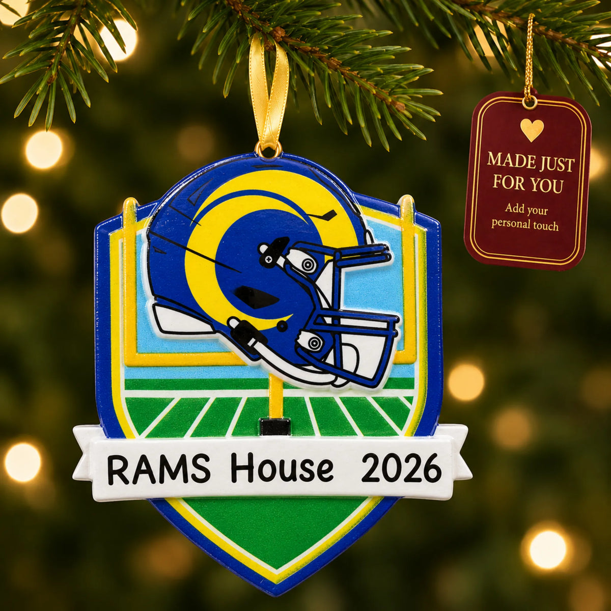 Los Angeles Rams NFL christmas ornament hanging on a lit Christmas tree with a Made Just For You gift tag