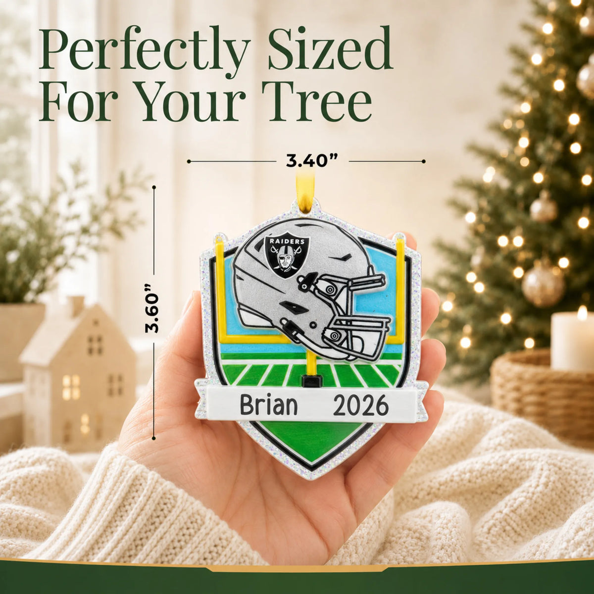Size guide: the personalized Las Vegas Raiders NFL christmas ornament is 3.40 in wide by 3.60 in tall, shown in hand