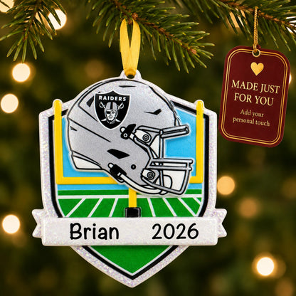 Las Vegas Raiders NFL christmas ornament hanging on a lit Christmas tree with a Made Just For You gift tag