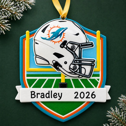 Personalized Miami Dolphins NFL christmas ornament on a dark green pine background