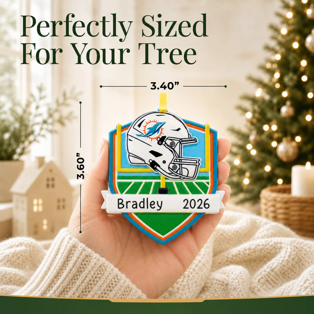 Size guide: the personalized Miami Dolphins NFL christmas ornament is 3.40 in wide by 3.60 in tall, shown in hand