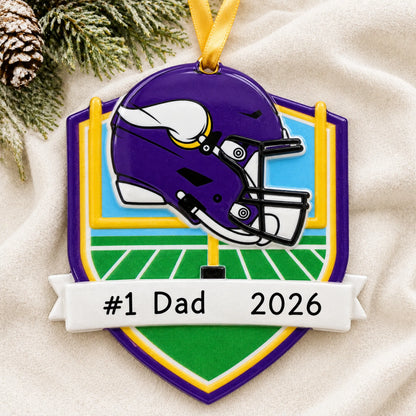 Personalized Minnesota Vikings NFL christmas ornament laid on a soft white knit blanket