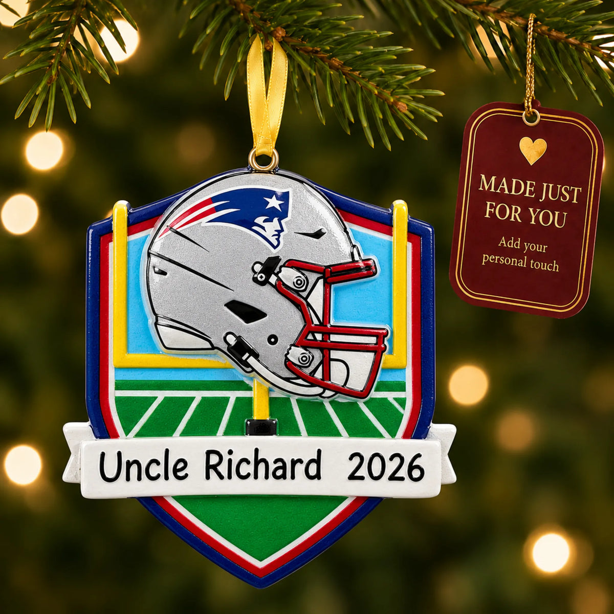 New England Patriots NFL christmas ornament hanging on a lit Christmas tree with a Made Just For You gift tag