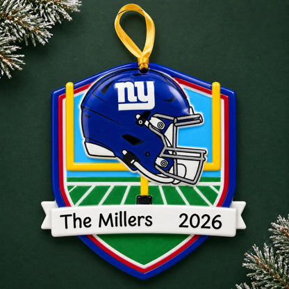 Personalized New York Giants NFL christmas ornament on a dark green pine background