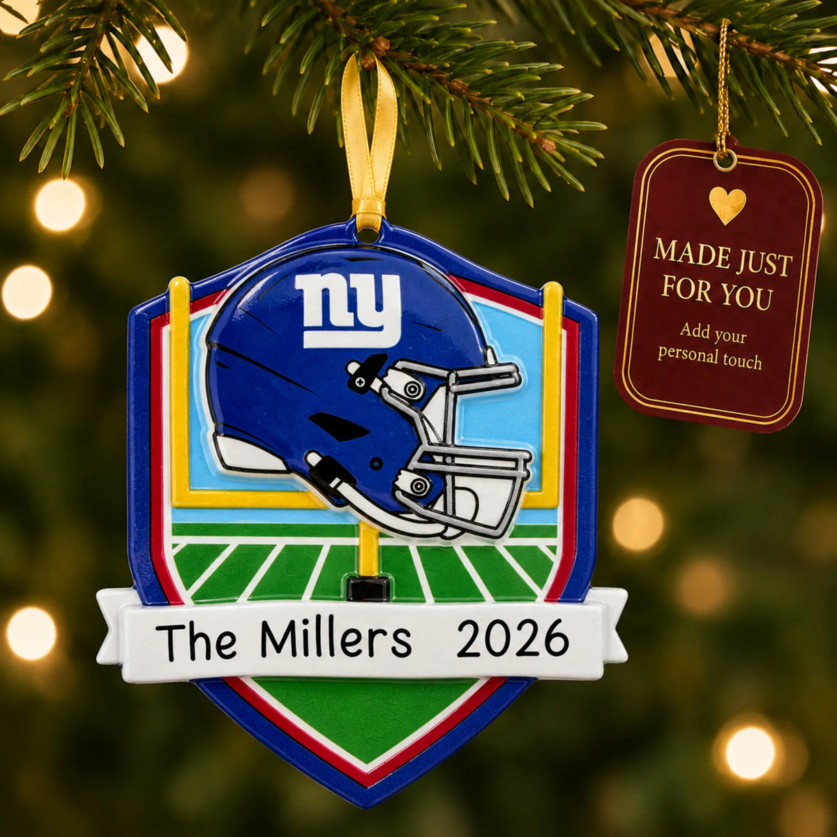 New York Giants NFL christmas ornament hanging on a lit Christmas tree with a Made Just For You gift tag