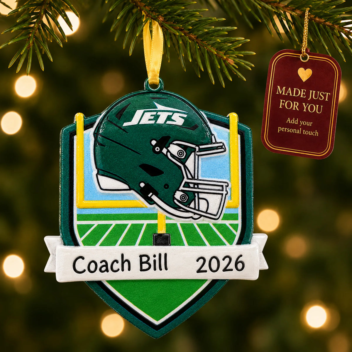New York Jets NFL christmas ornament hanging on a lit Christmas tree with a Made Just For You gift tag