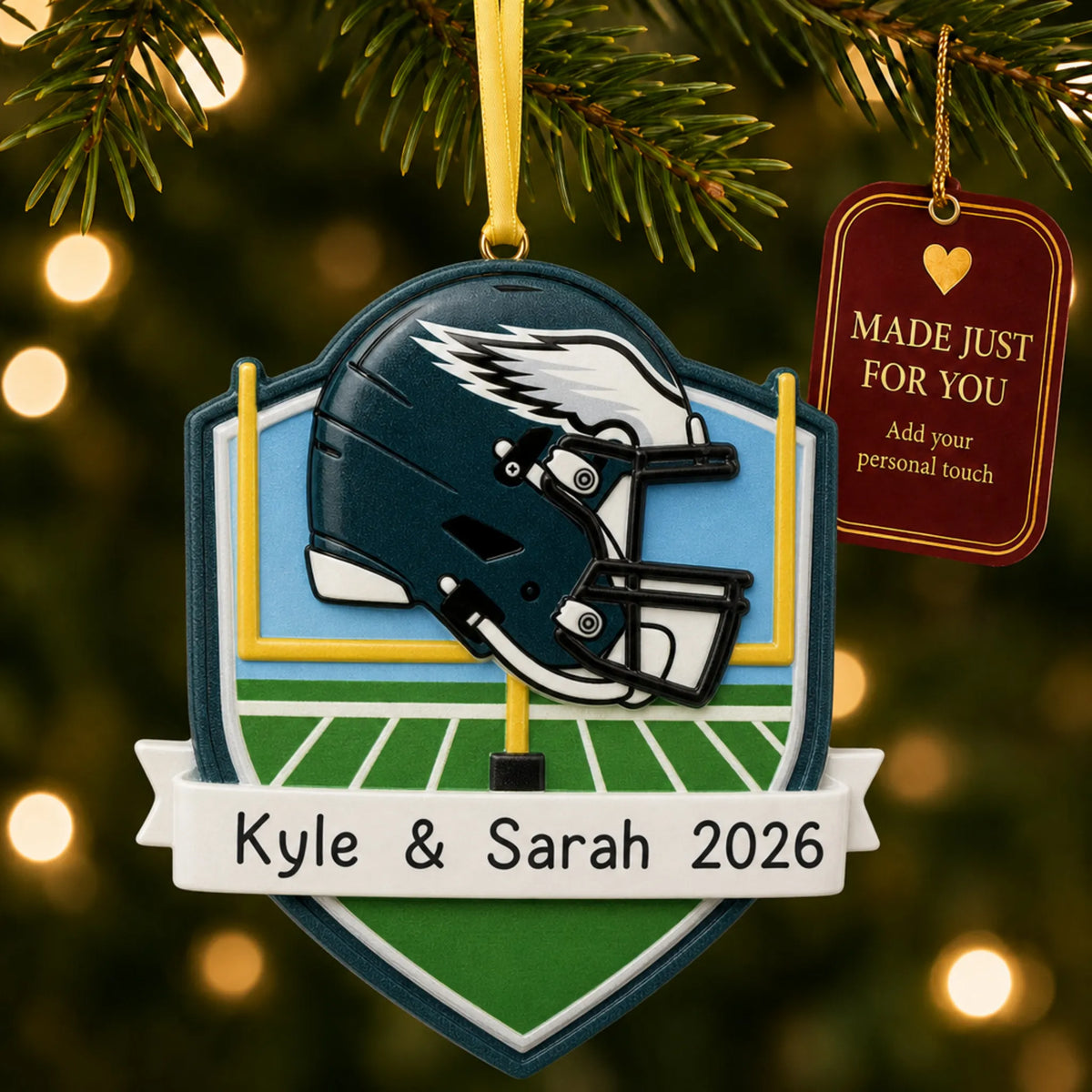 Philadelphia Eagles NFL christmas ornament hanging on a lit Christmas tree with a Made Just For You gift tag