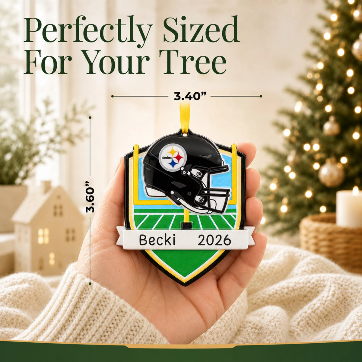 Size guide: the personalized Pittsburgh Steelers NFL christmas ornament is 3.40 in wide by 3.60 in tall, shown in hand