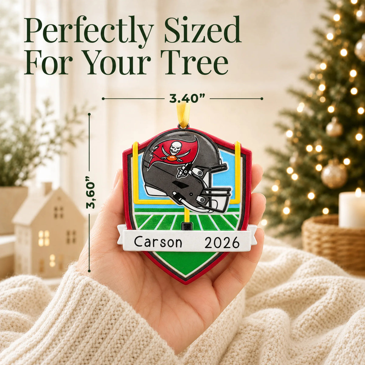 Size guide: the personalized Tampa Bay Buccaneers NFL christmas ornament is 3.40 in wide by 3.60 in tall, shown in hand