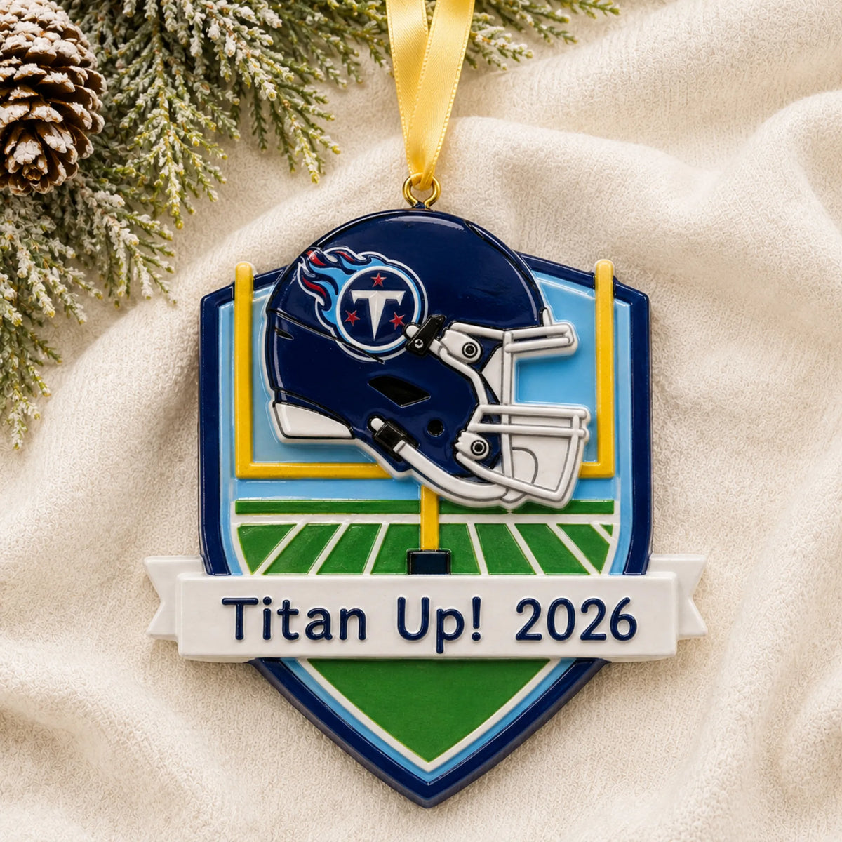 Personalized Tennessee Titans NFL christmas ornament laid on a soft white knit blanket