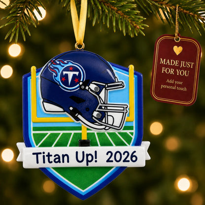 Tennessee Titans NFL christmas ornament hanging on a lit Christmas tree with a Made Just For You gift tag