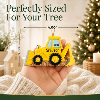 Size guide: the personalized backhoe christmas ornament is 4.00 in wide by 2.50 in tall, shown in hand