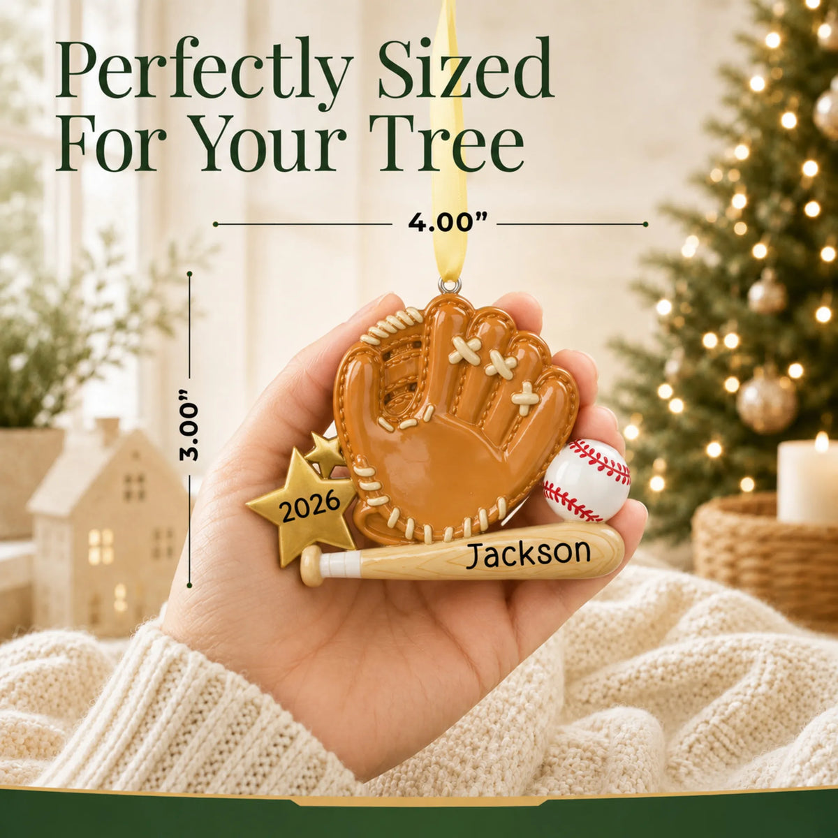 Size guide: the personalized baseball bat, glove and ball christmas ornament shown in hand next to a Christmas tree