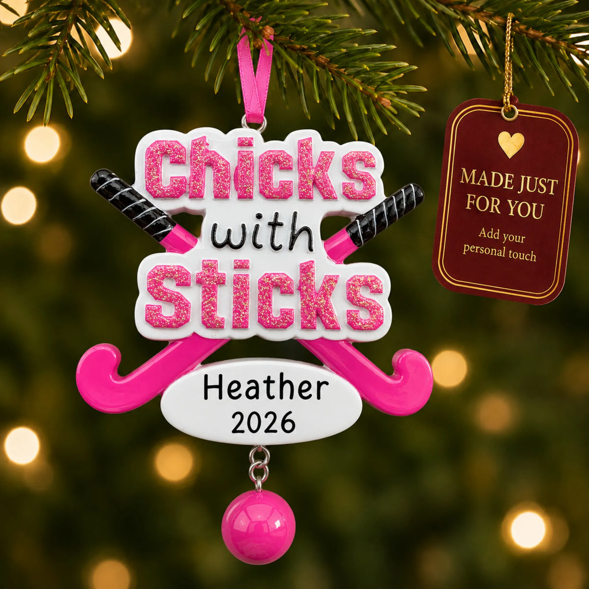 Field hockey christmas ornament hanging on a lit Christmas tree with a Made Just For You gift tag