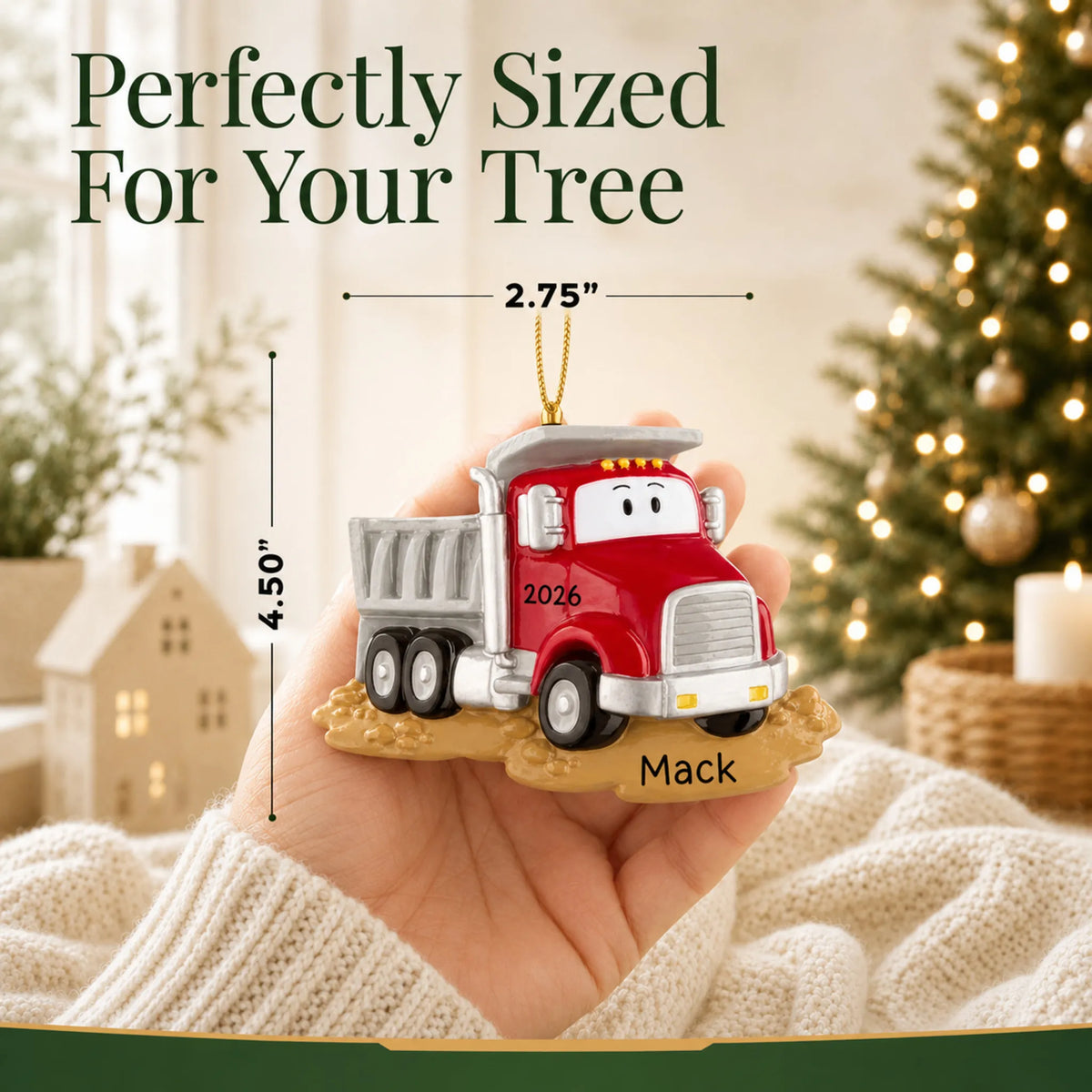 Size guide: the personalized construction dump truck christmas ornament is 2.75 in wide by 4.50 in tall, shown in hand
