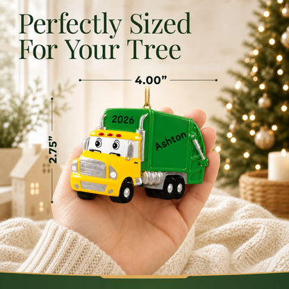 Size guide: the personalized garbage truck christmas ornament is 4.00 in wide by 2.75 in tall, shown in hand