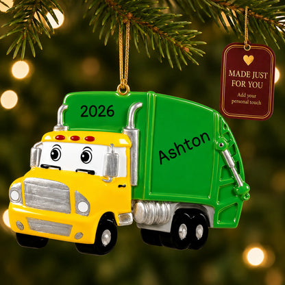 Garbage truck christmas ornament hanging on a lit Christmas tree with a Made Just For You gift tag